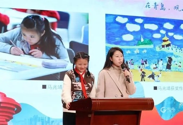 孤獨癥孩子走上青島中小學生暑假繪畫（創(chuàng)意設計）比賽獎臺